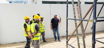 A Trainer is describing the Steel Scaffolding Training in Dubai at DAMAC Lagoons Project.